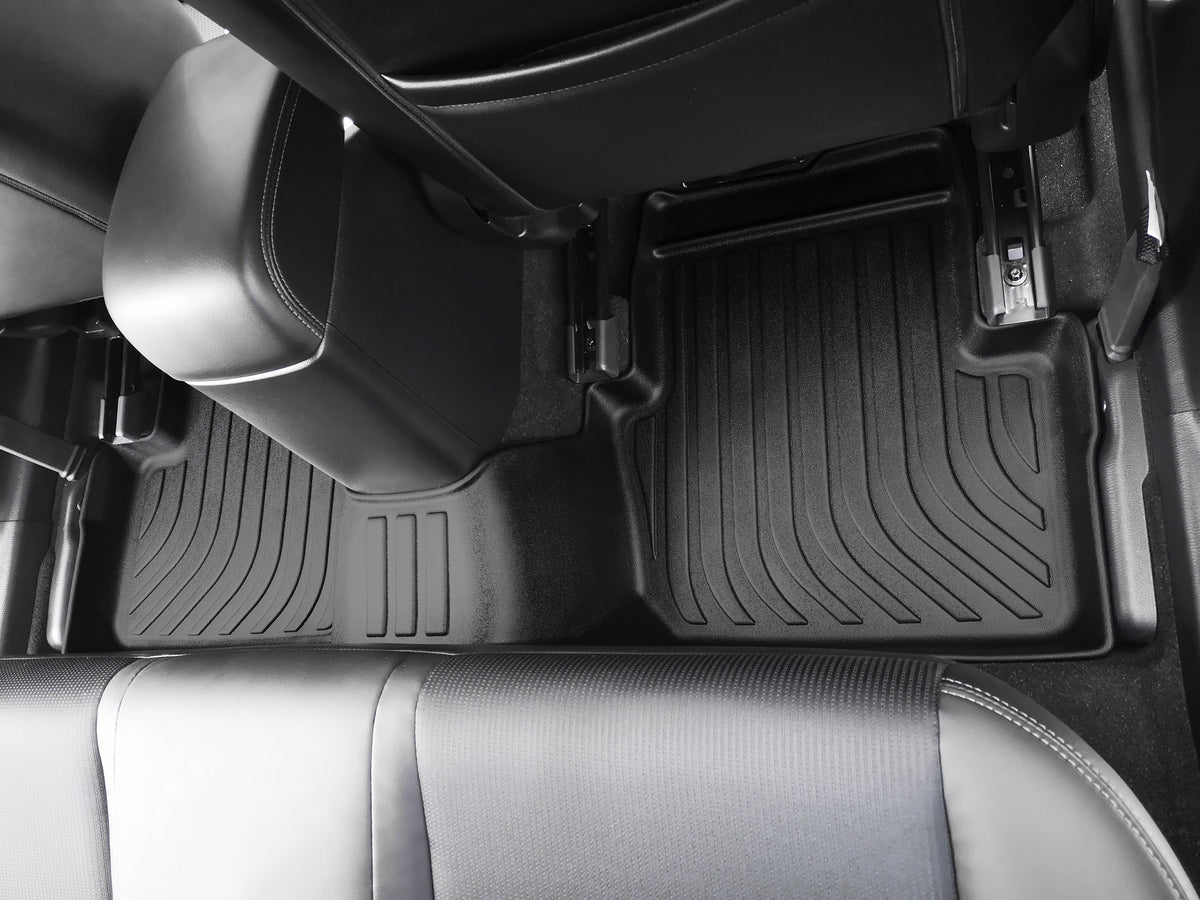 Car interior with Findway floor mats in the second row